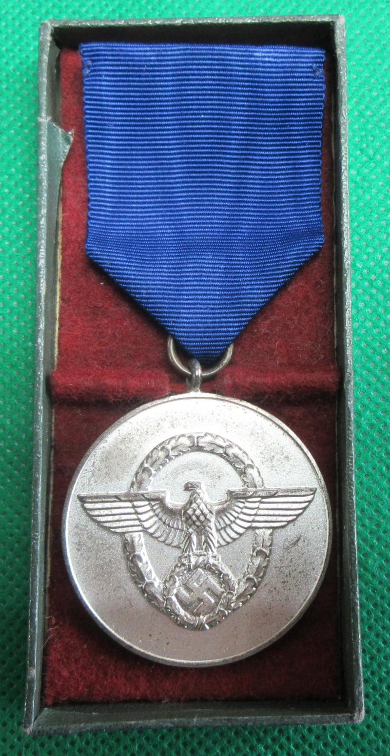 POLICE 8 YEAR SERVICE MEDAL & HALF CASE.