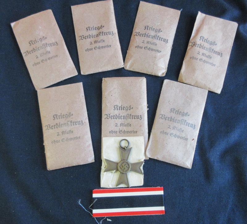 GROUP, 2ND CLASS WAR MERIT CROSSES AND ISSUE PACKETS